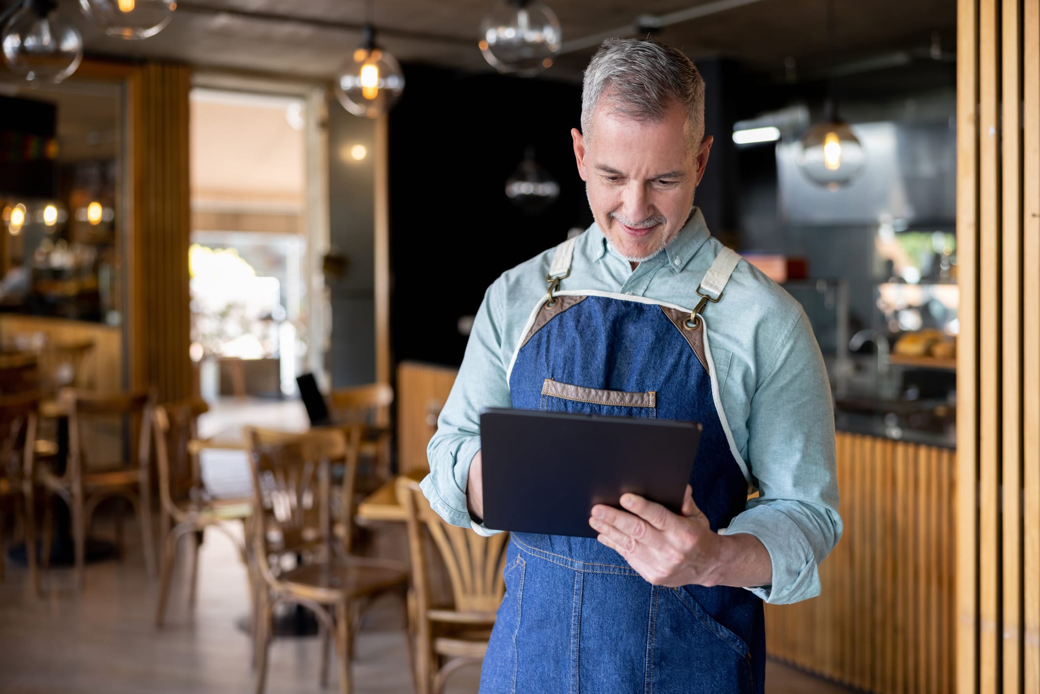 Business owner using a tablet computer